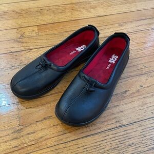 SAS Black Slip-On Shoes with Red Lining